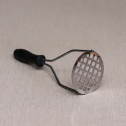 Potato masher with plastic handle